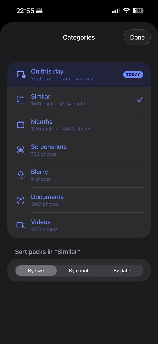 The Categories screen on a real phone: Similar with 1,661 packs, Months with 14,023 photos, Screenshots, Blurry, Documents and Videos.